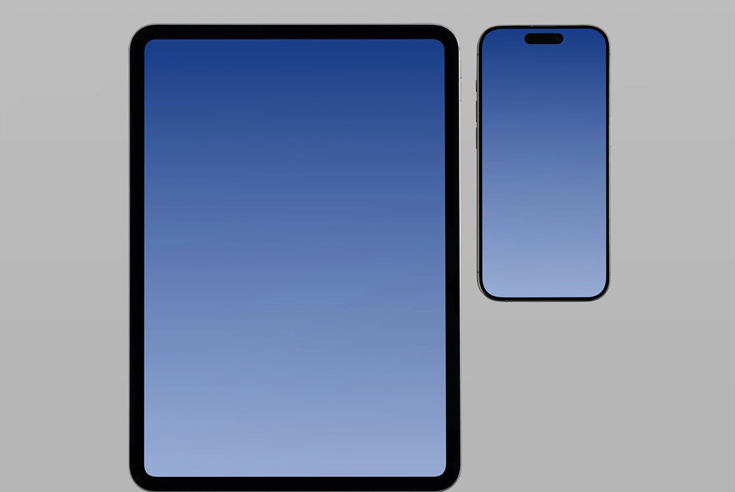 Tablet with rounded corners next to smartphone, both with blue gradient screens on gray background