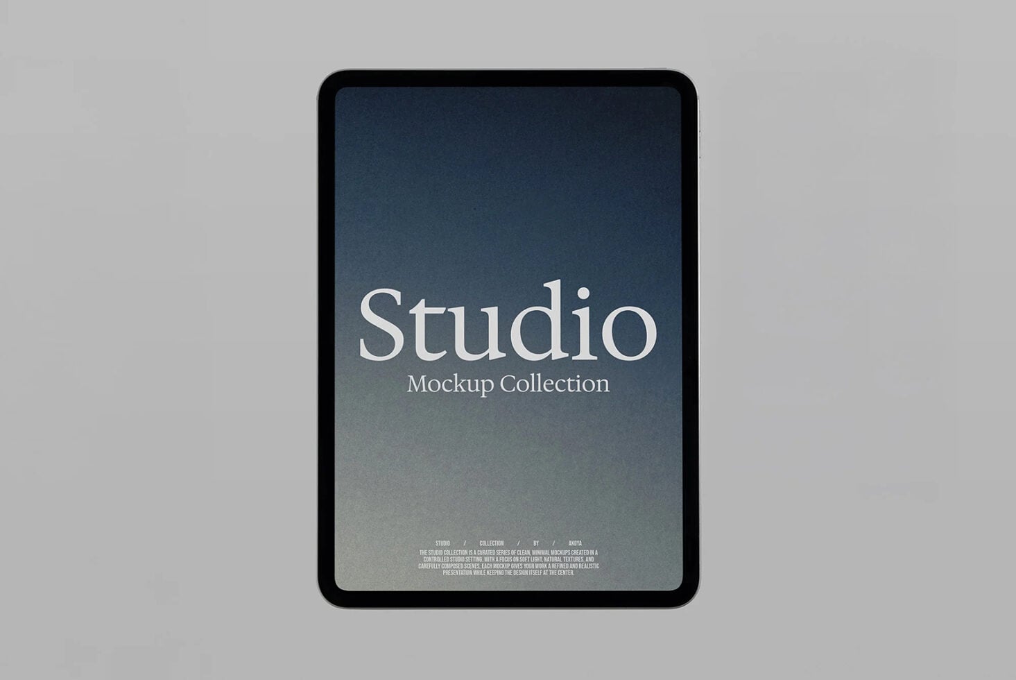 Tablet mockup with rounded black bezel displaying elegant serif typography on blue gradient background
