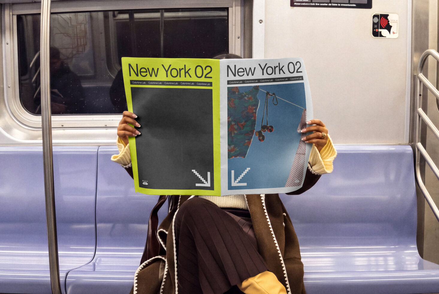 Person holding two magazine mockups on subway car, one neon yellow one blue with photography