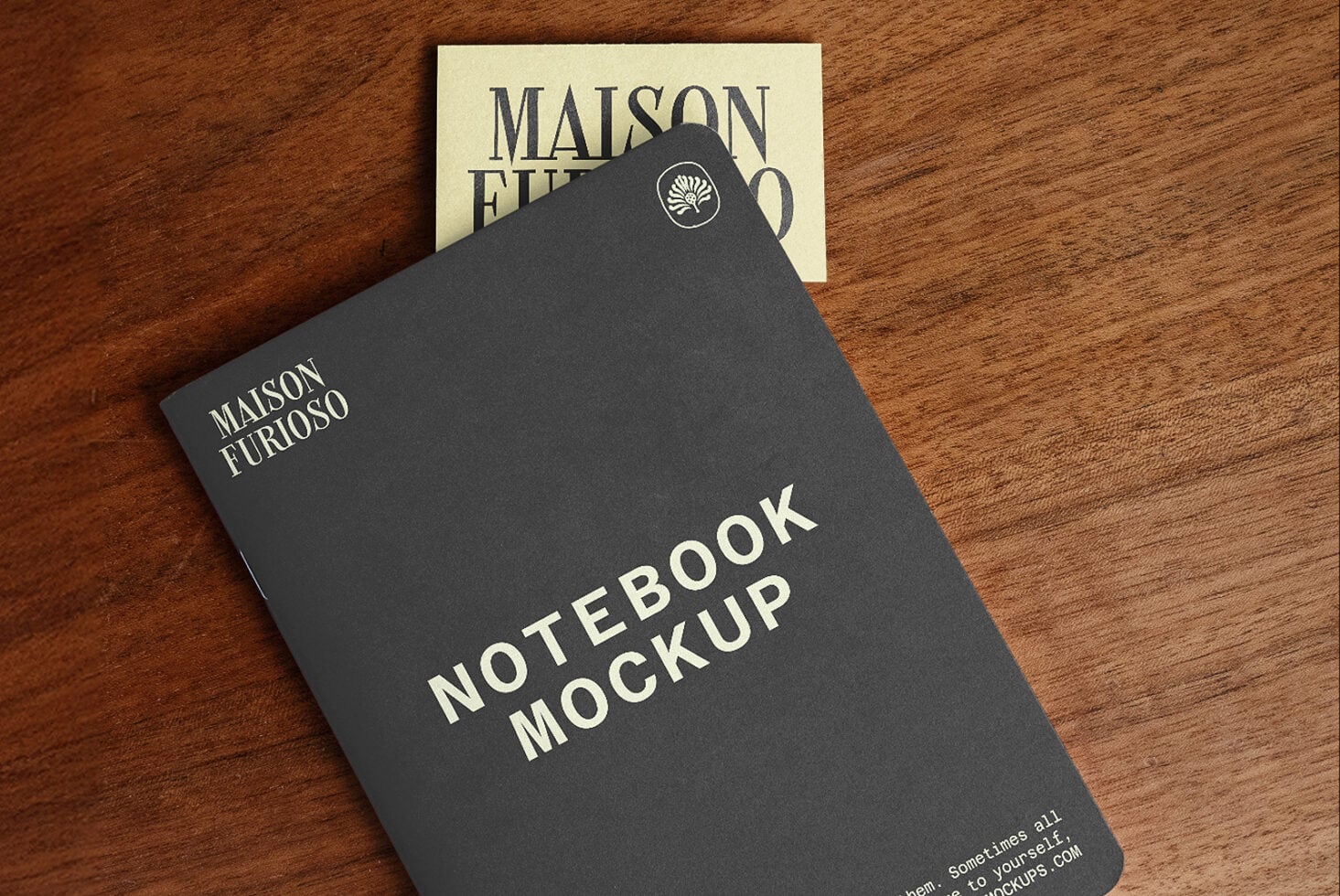 Charcoal notebook with cream business card on wood surface, luxury brand branding mockup