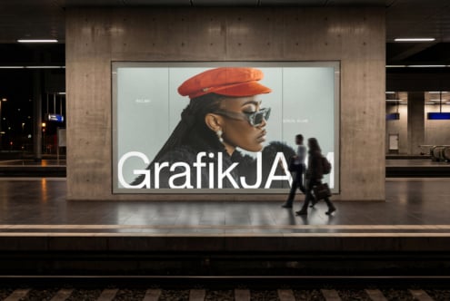 Billboard mockup showing transit ad with portrait of person wearing red cap, sunglasses in modern station setting