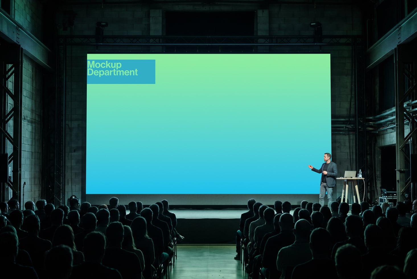 Large projection screen mockup showing bright mint gradient with blue text box during conference presentation