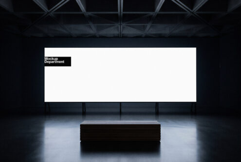 Large billboard mockup in dark industrial space with concrete podium below