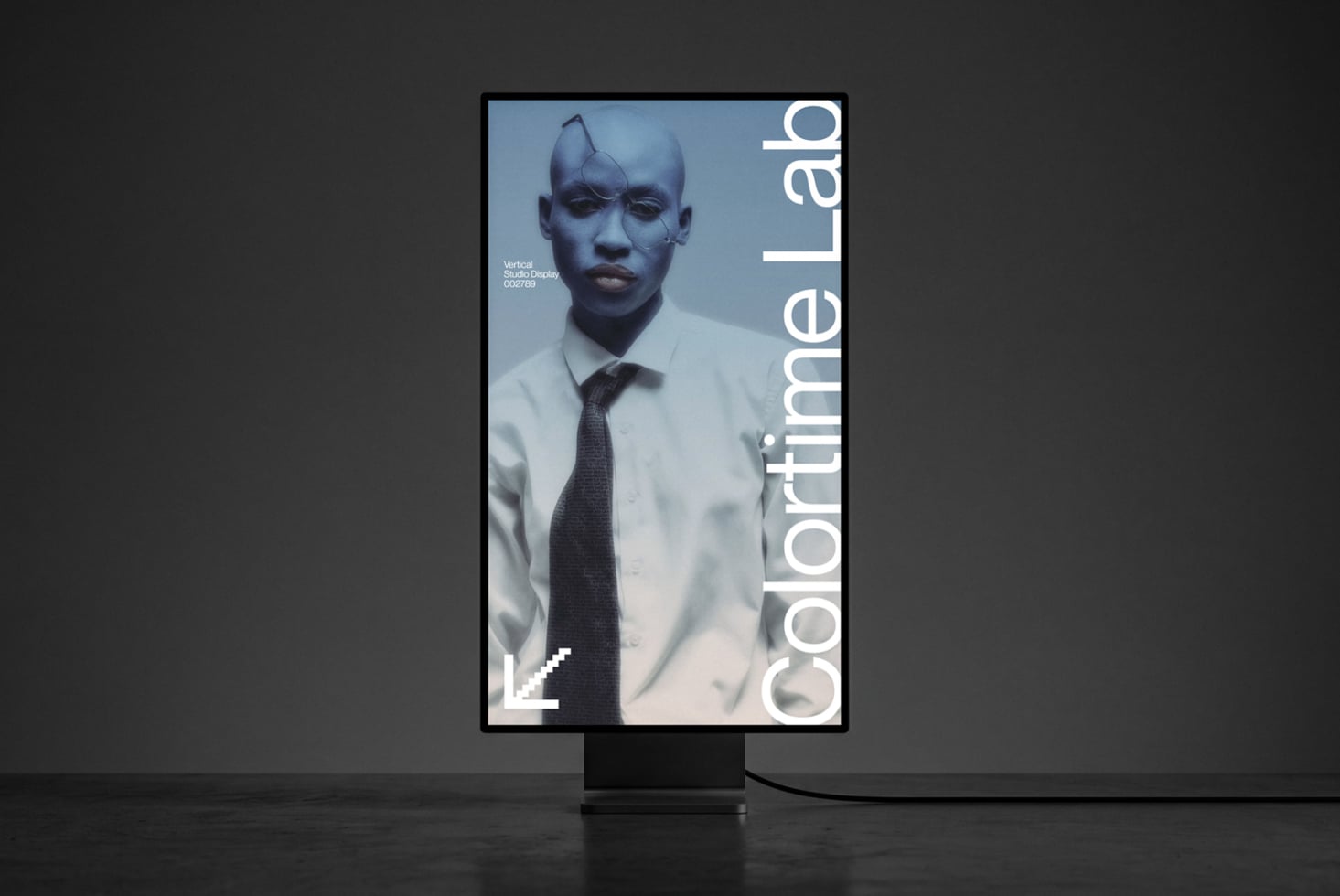 Vertical studio display mockup showing portrait of man in white shirt with tie on blue background
