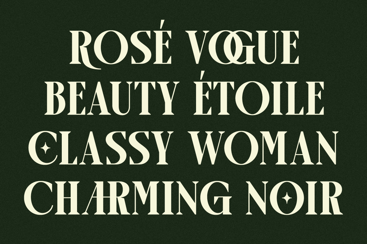 Elegant serif font in cream on deep forest green with French fashion phrases in all caps