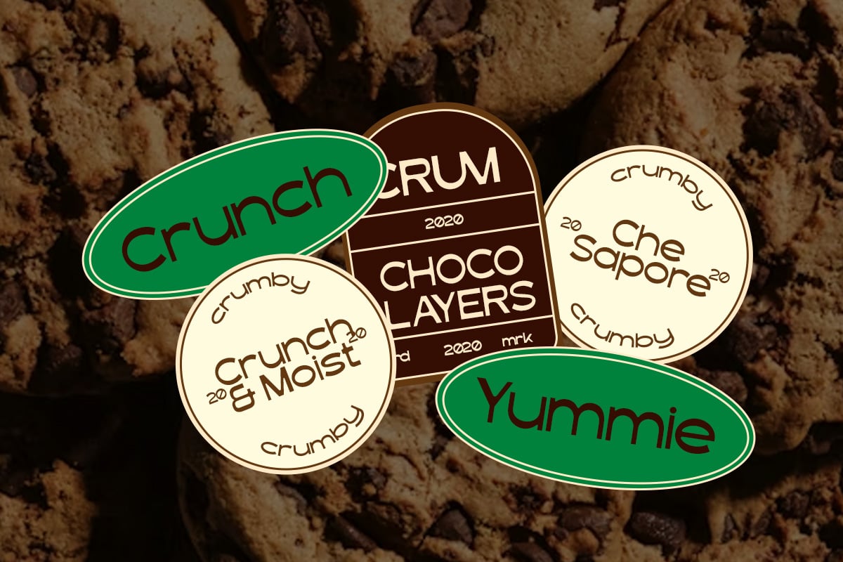 Retro chocolate bar label stickers with cream circles plus green ovals on crumbly texture background