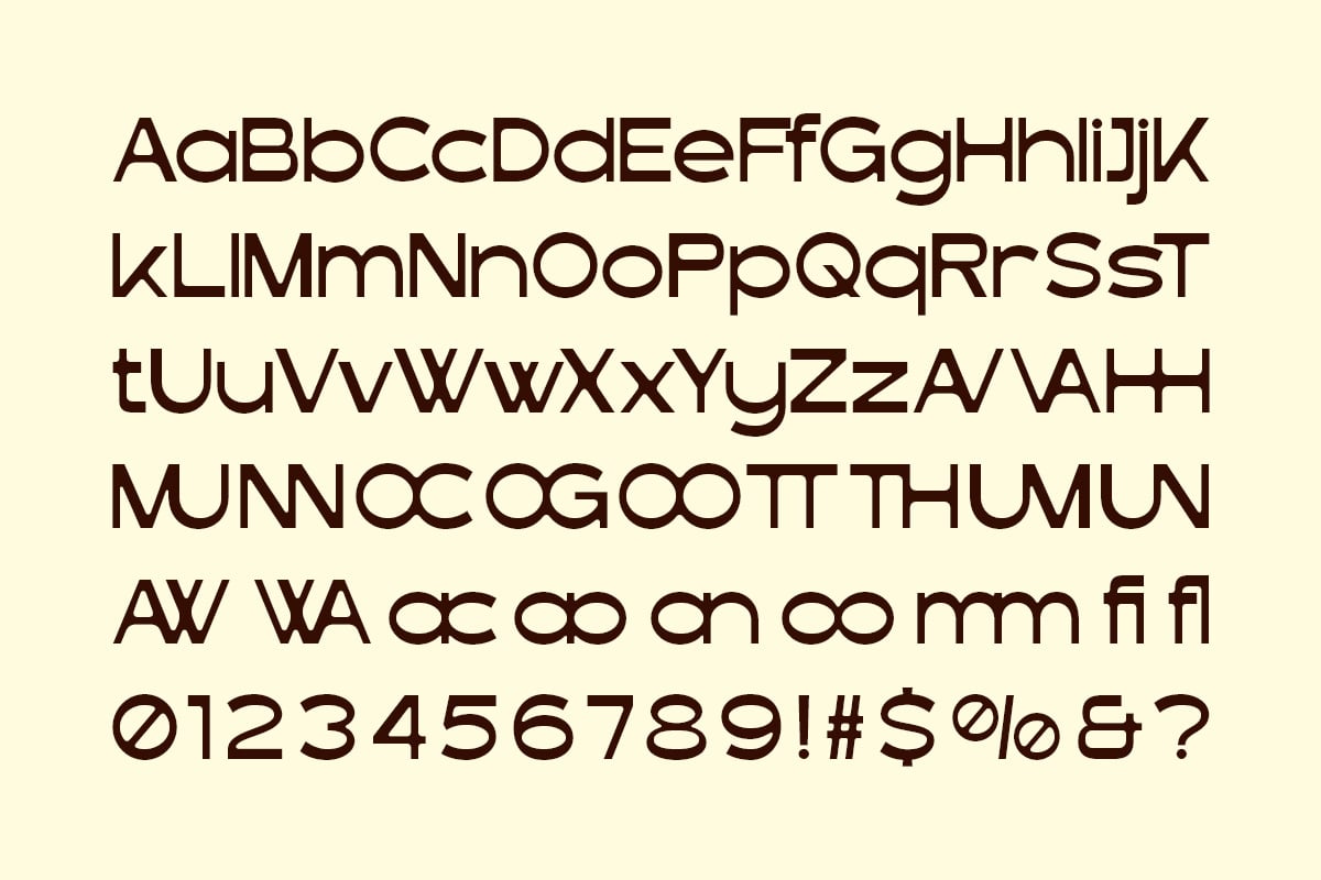 Bold rounded sans-serif font with full character set on cream background