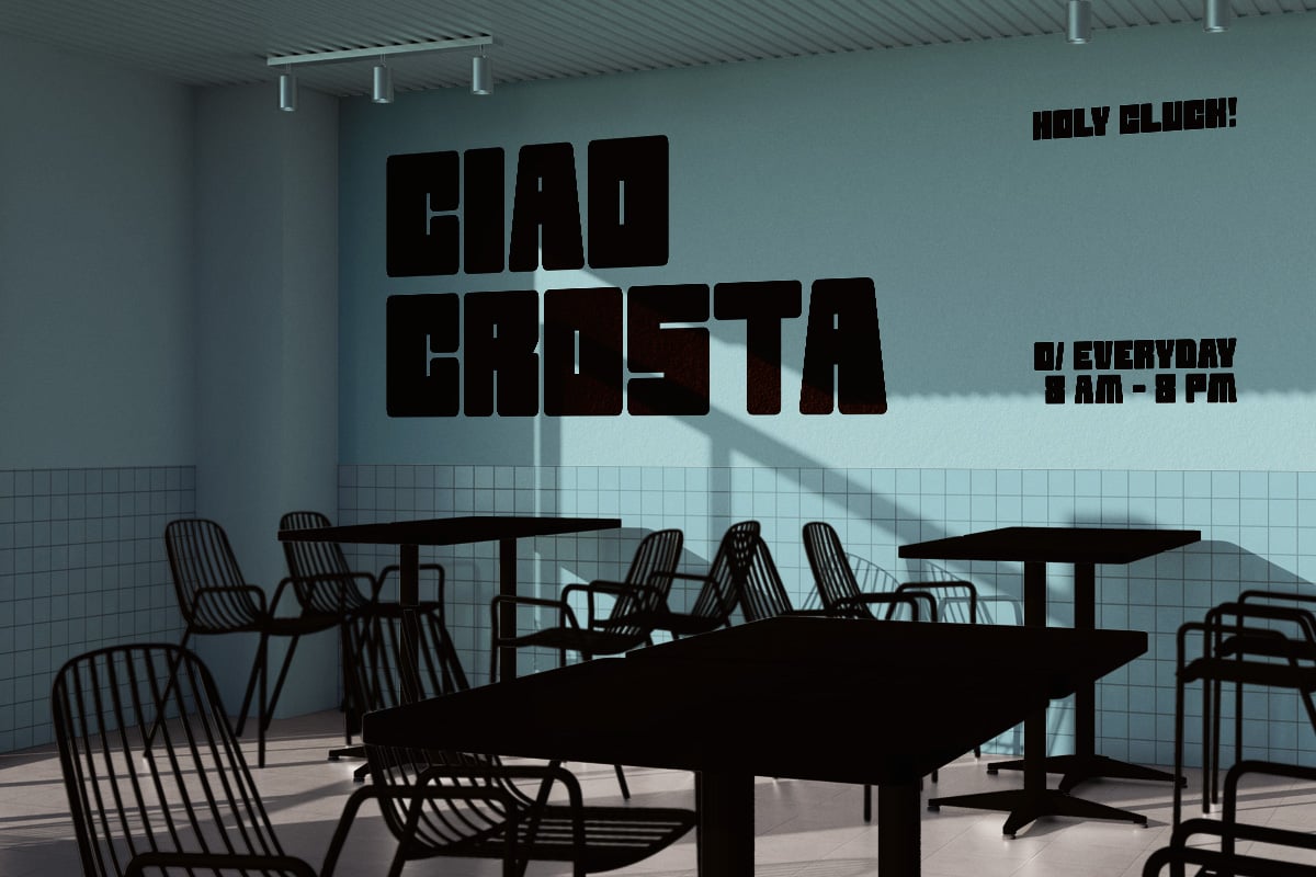 Retro cafe interior mockup with bold black typography on mint walls, silhouetted furniture