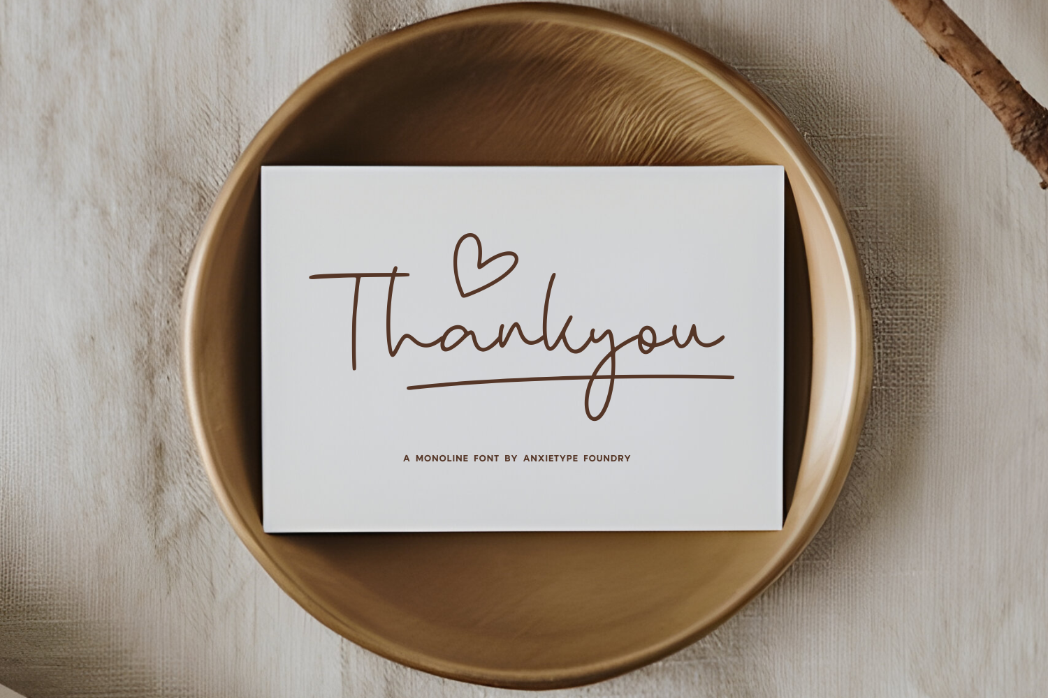 White card in gold bowl showing handwritten "Thank you" with heart monoline font mockup
