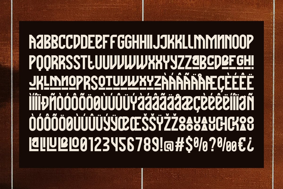 Bold geometric sans-serif font with extended character set showing letters, numbers, accents, symbols on black background