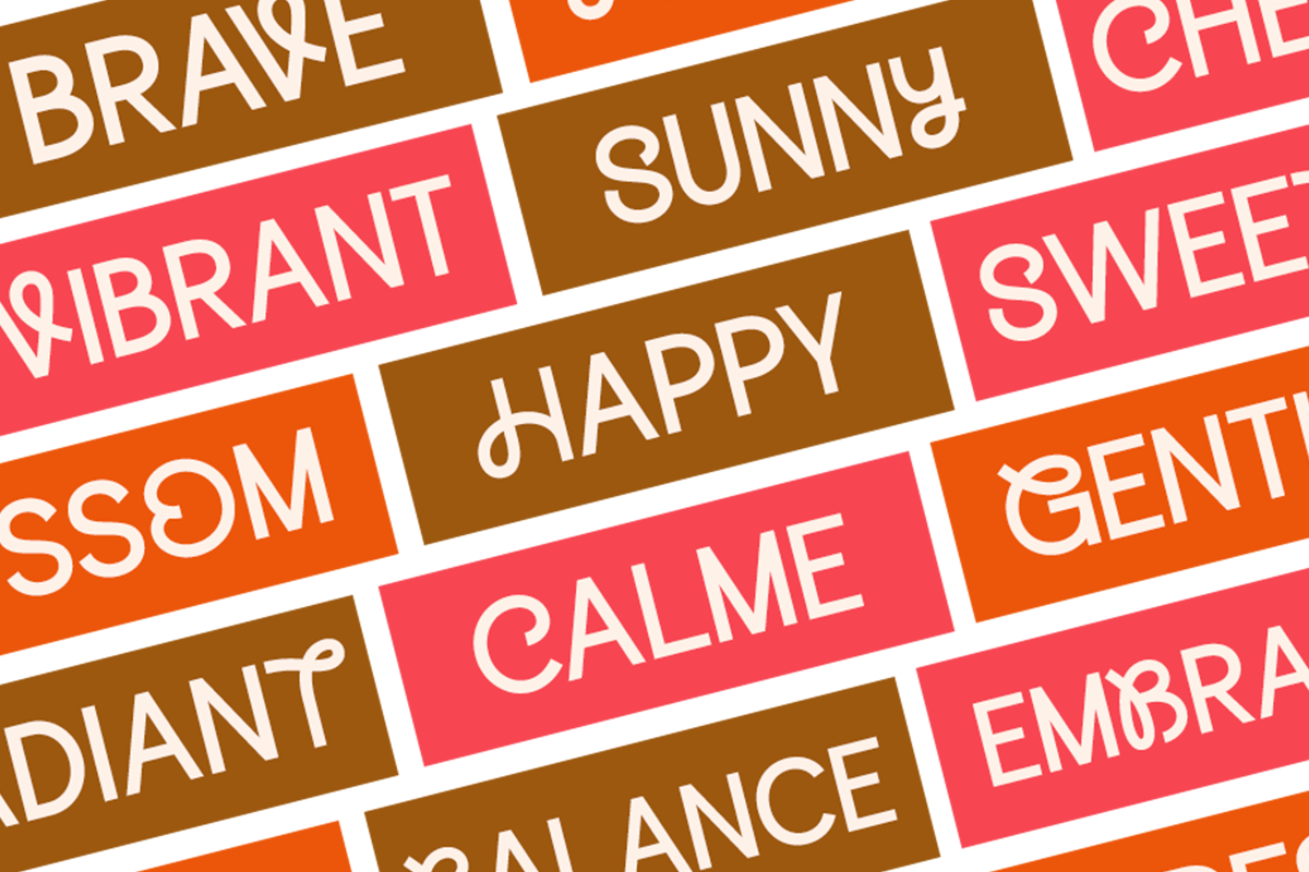 Colorful diagonal label strips with positive words like brave, sunny, happy, calm in white lettering