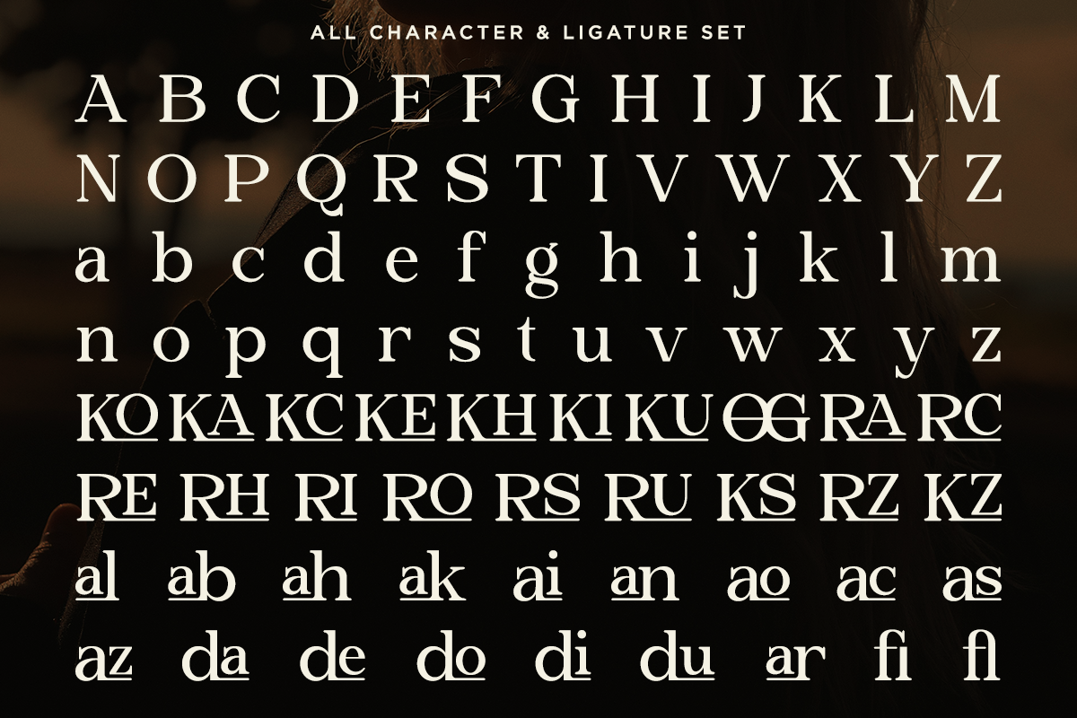 Serif font showing full alphabet, lowercase, ligatures, with moody brown textured background