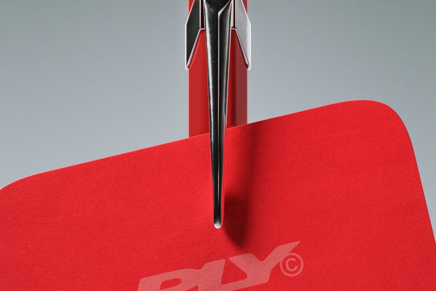 Sleek pen mockup on open red notebook with gray background, clean product shot