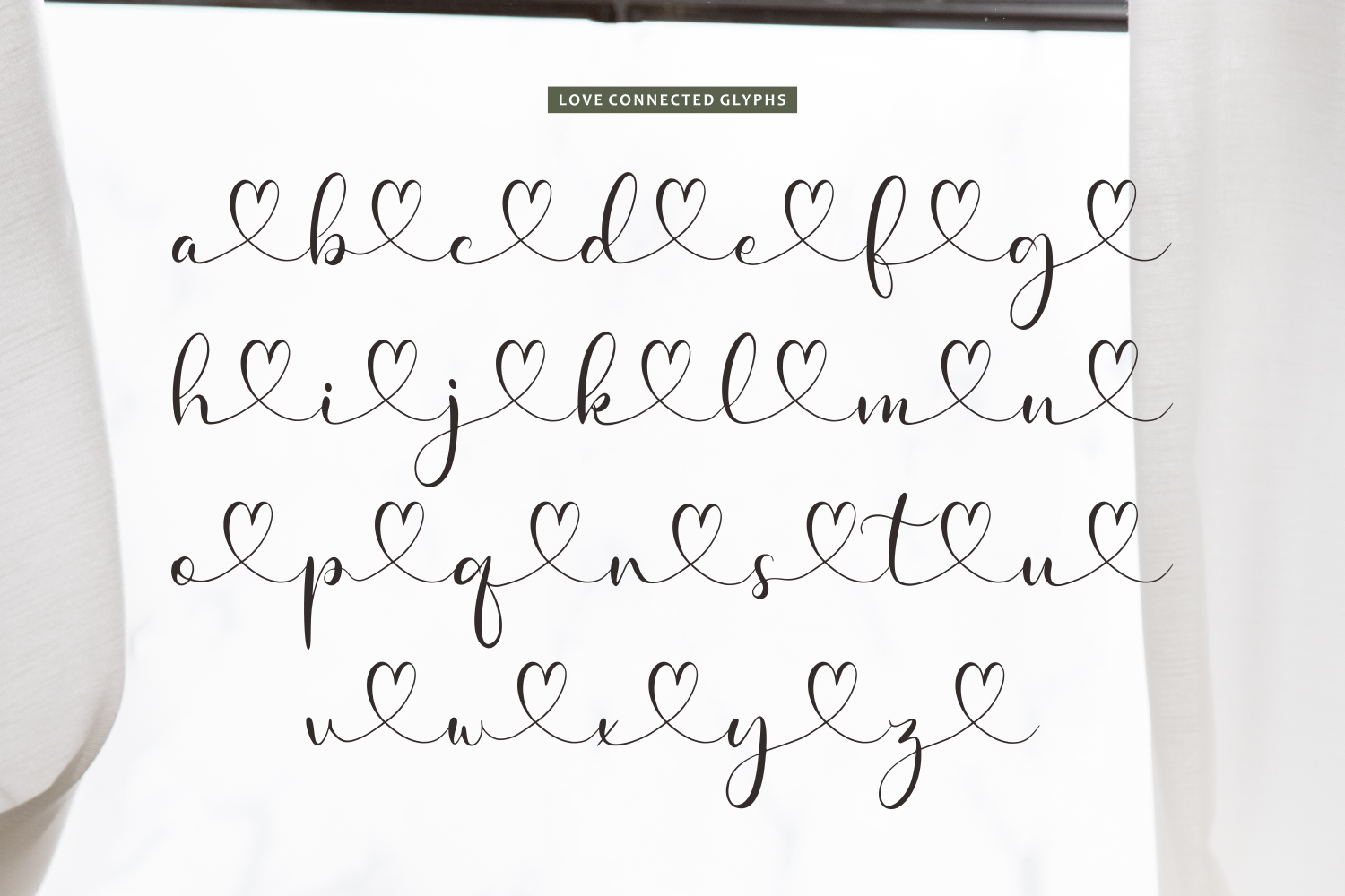 Love Connected Glyphs font with heart connectors linking each letter together