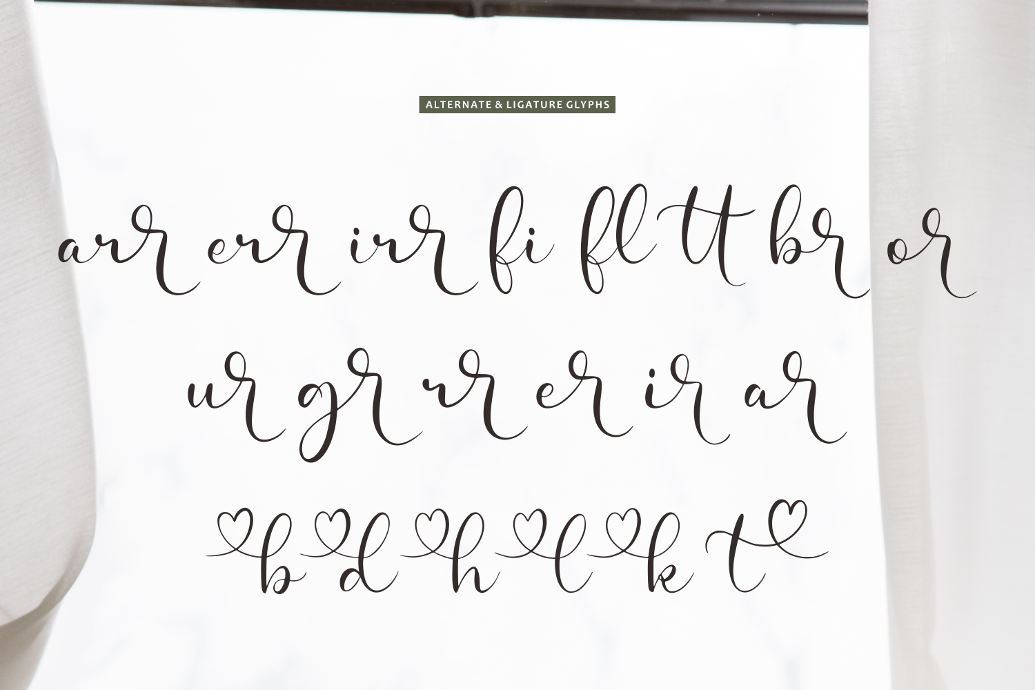 Font character sheet showing script alternates, ligatures with heart flourishes, elegant cursive variations