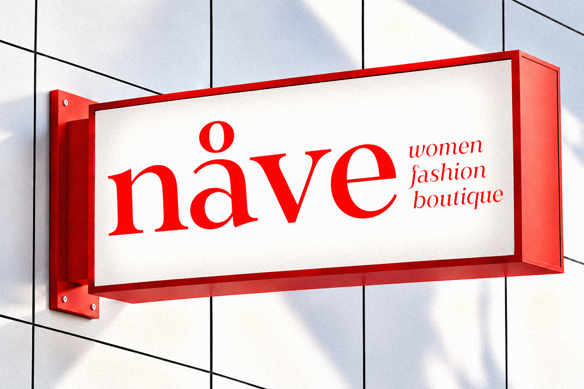 Red storefront sign mockup with "näve" fashion boutique branding on modern building facade