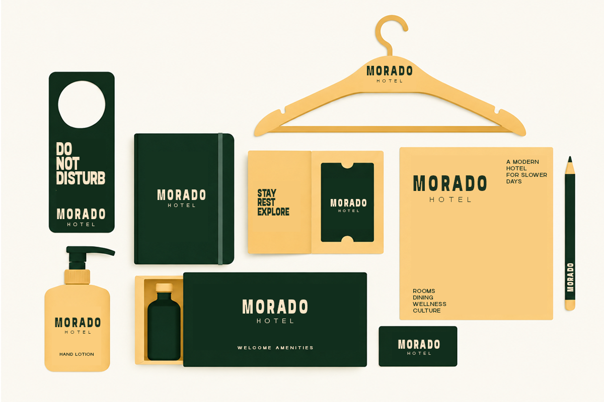 Morado Hotel brand identity mockup with green, gold collateral items like hangers, notebooks, key cards, business cards, lotion bottle