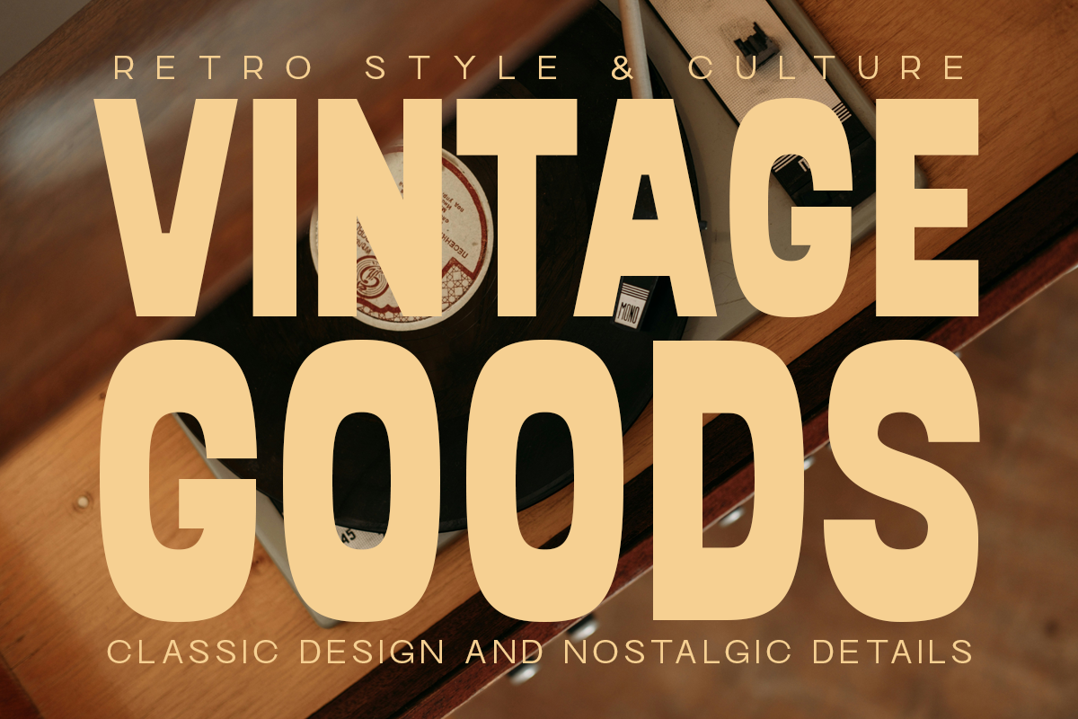 Cream-colored vintage typography overlaid on wooden surface with retro objects