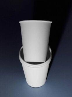Blank white paper coffee cup mockup stacked on dark background