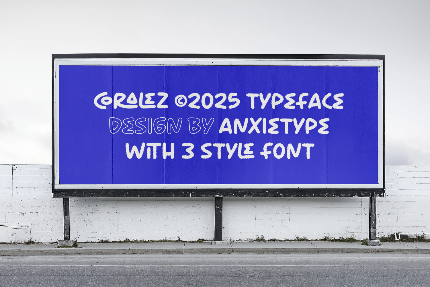 Coralez 2025 typeface displayed on bright blue billboard with 3 style variations