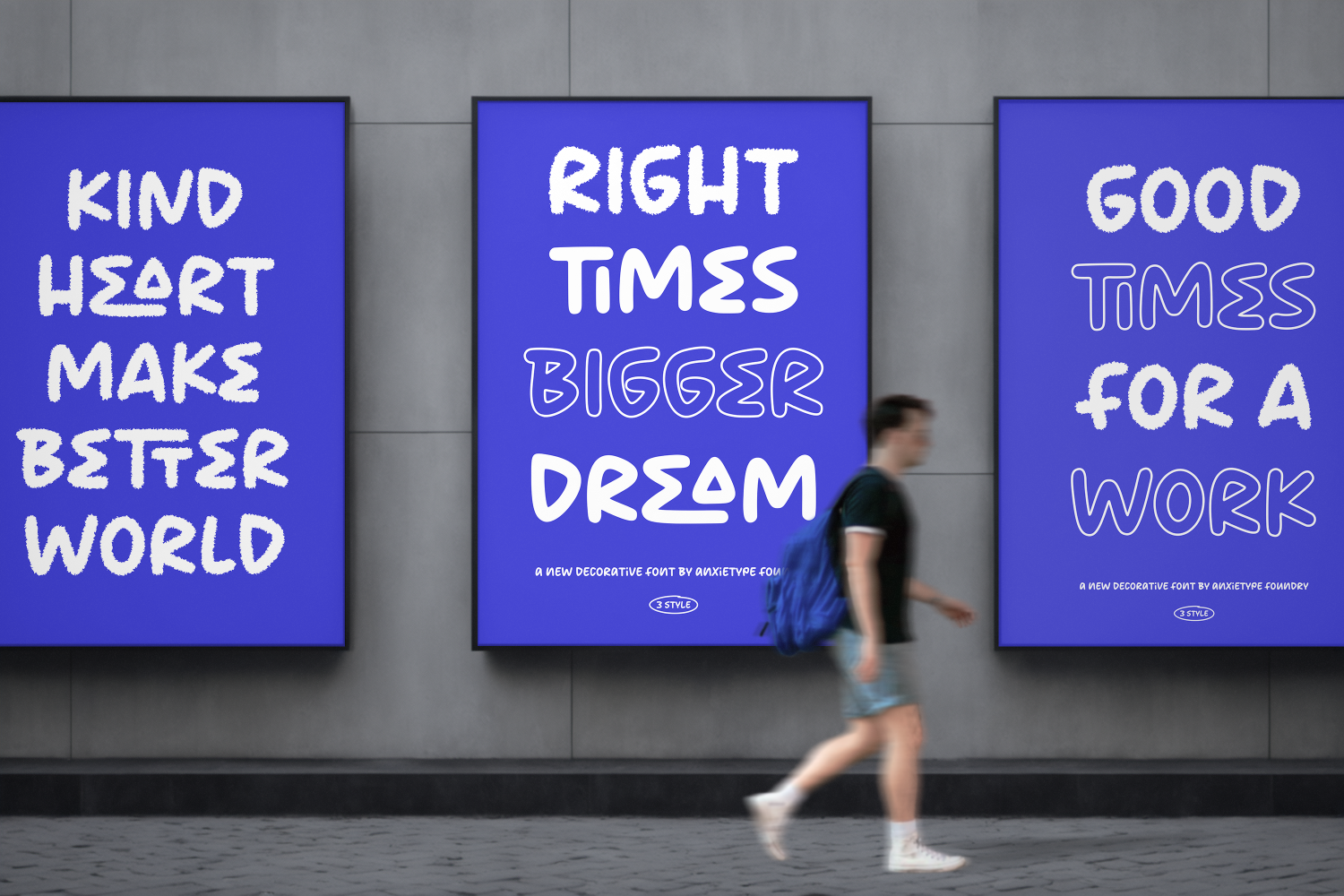 Three bright blue billboard mockups with bold hand-drawn font displaying motivational quotes on urban wall
