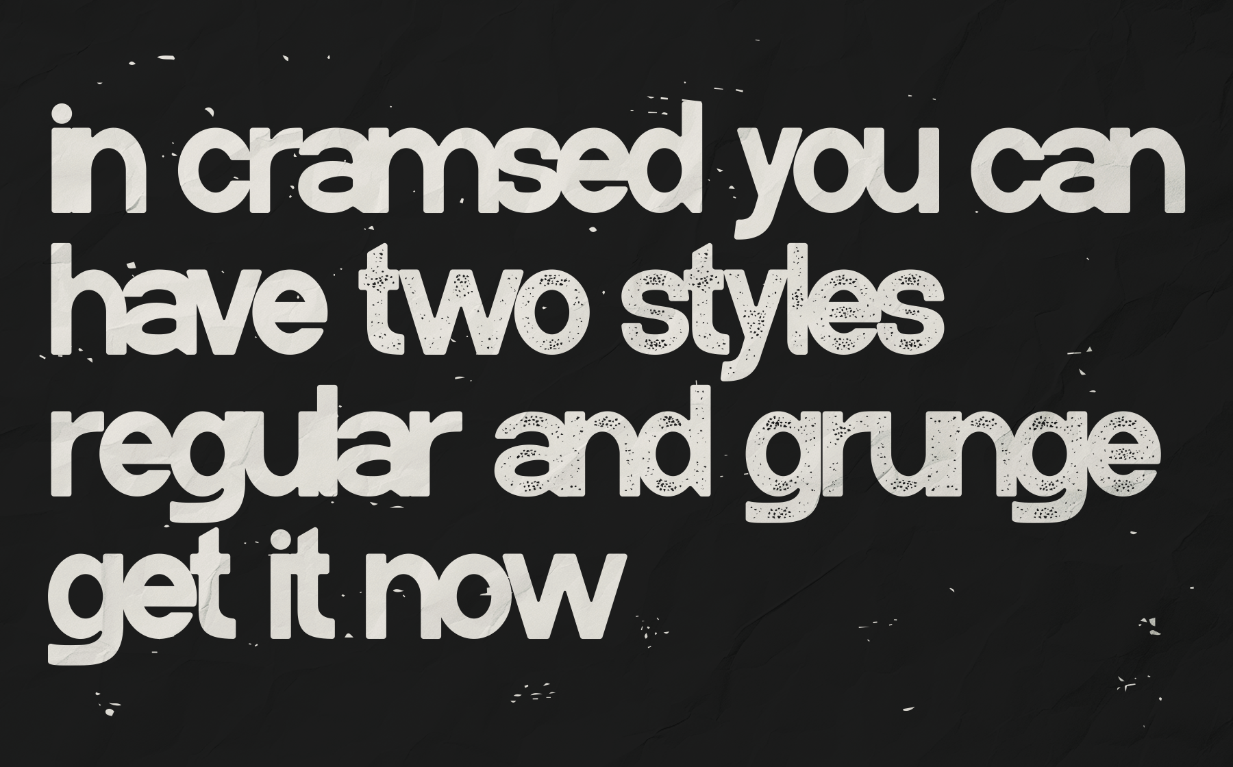 Chunky sans serif font with speckled texture on dark background showing regular plus grunge weight