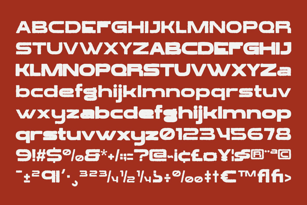 Bold sans serif font showing uppercase, lowercase, numbers, plus special characters on rust red background