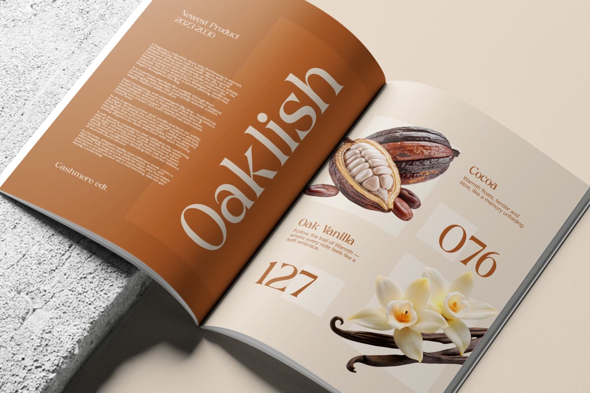 Open magazine spread showing OakKisn branding with cocoa pods, vanilla beans, ingredient photography on warm tan pages