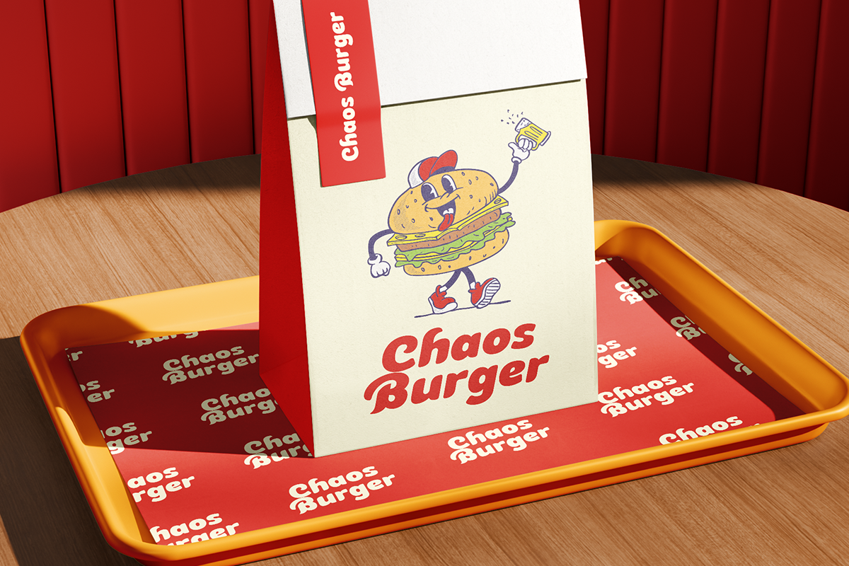Chaos Burger retro branding mockup with quirky mascot character, menu, napkins on wooden table