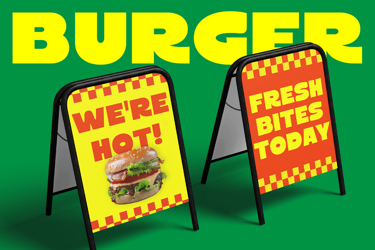 Retro burger shop A-frame signs with neon yellow text on green background mockup