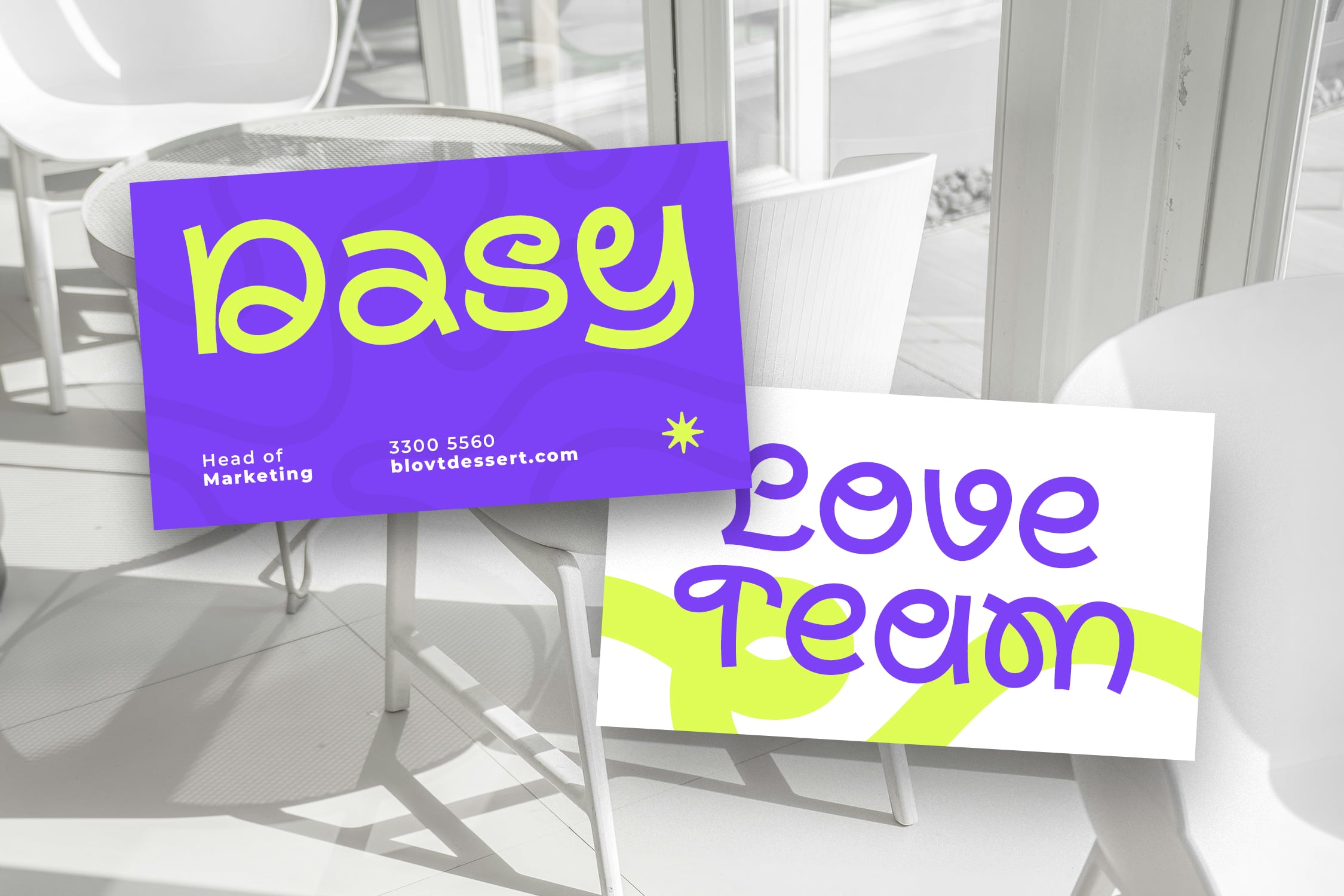 Business cards mockup with neon purple, lime text on modern office chairs