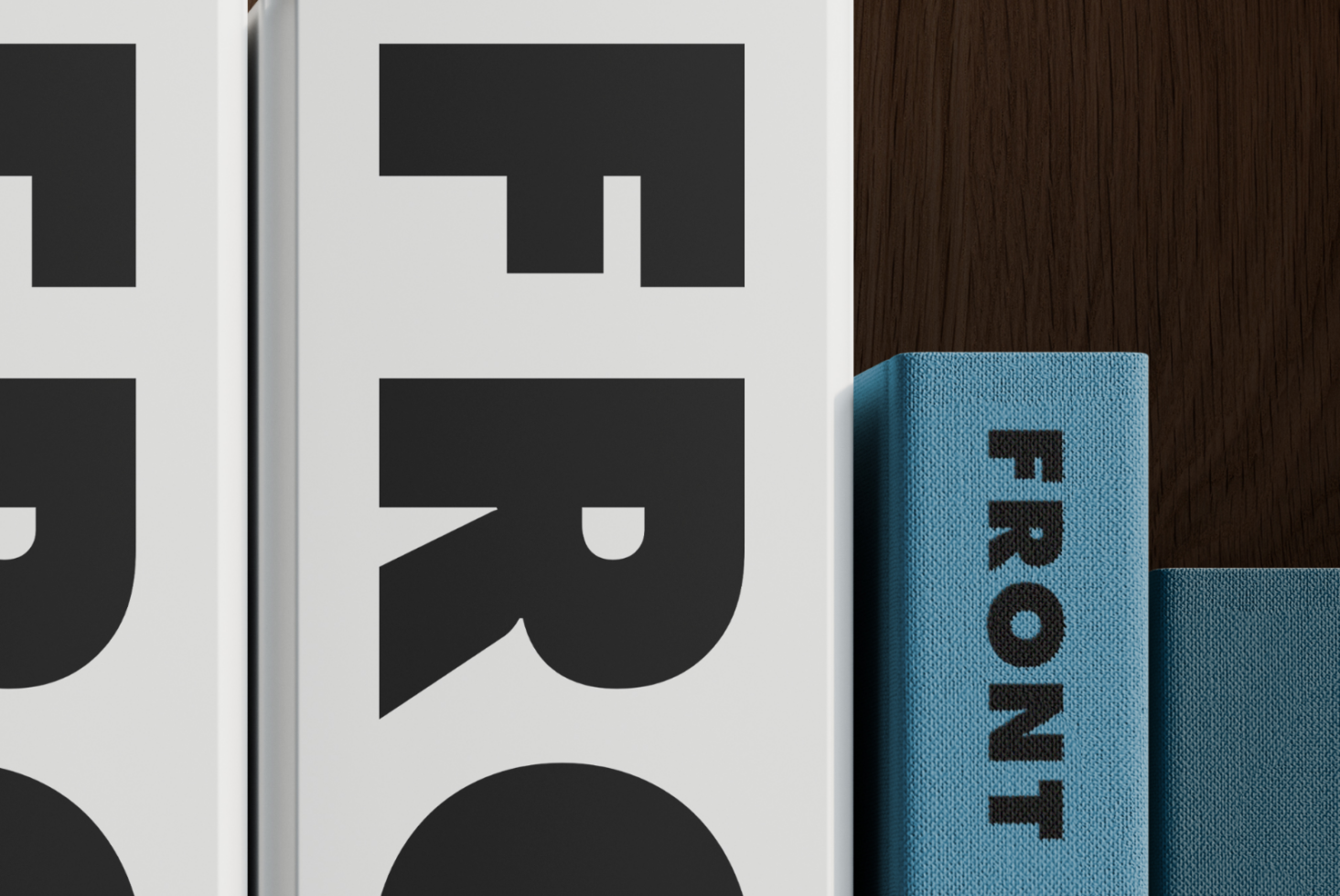 Book cover mockup with teal fabric texture, geometric typography on spine