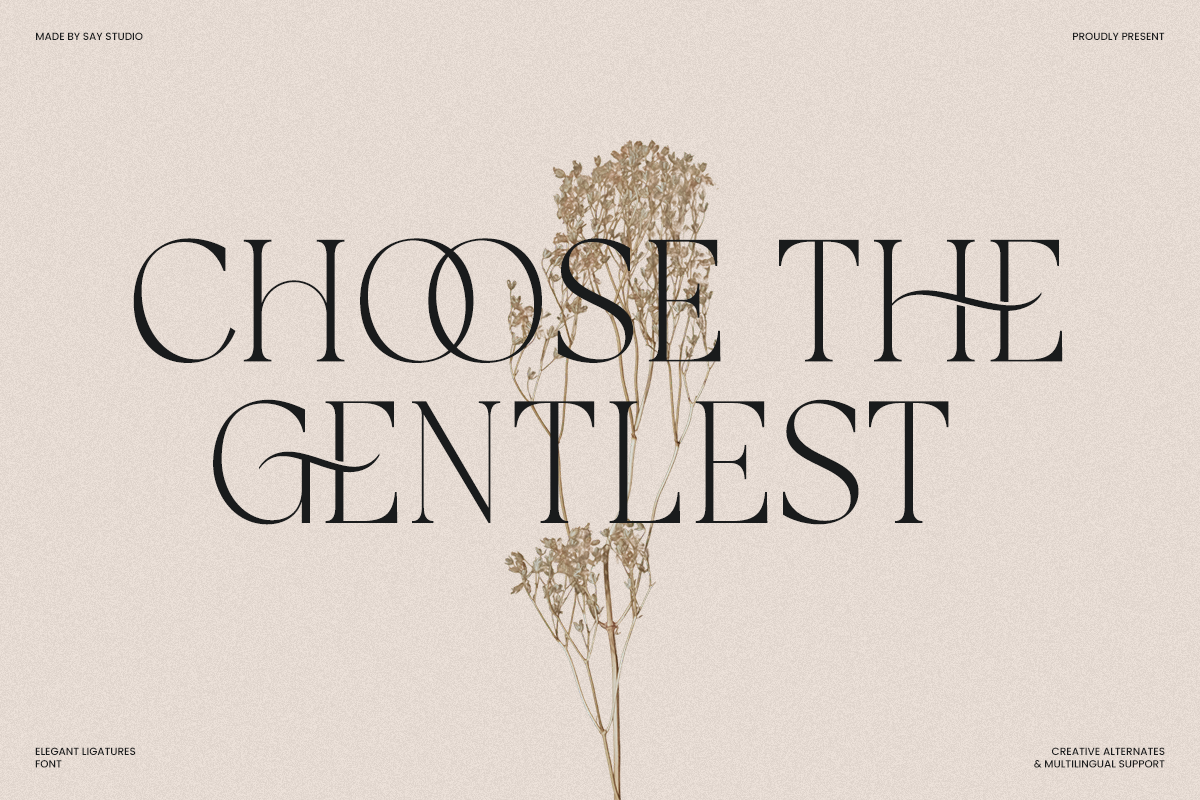 Elegant serif font with ligatures displayed over dried flowers on beige background