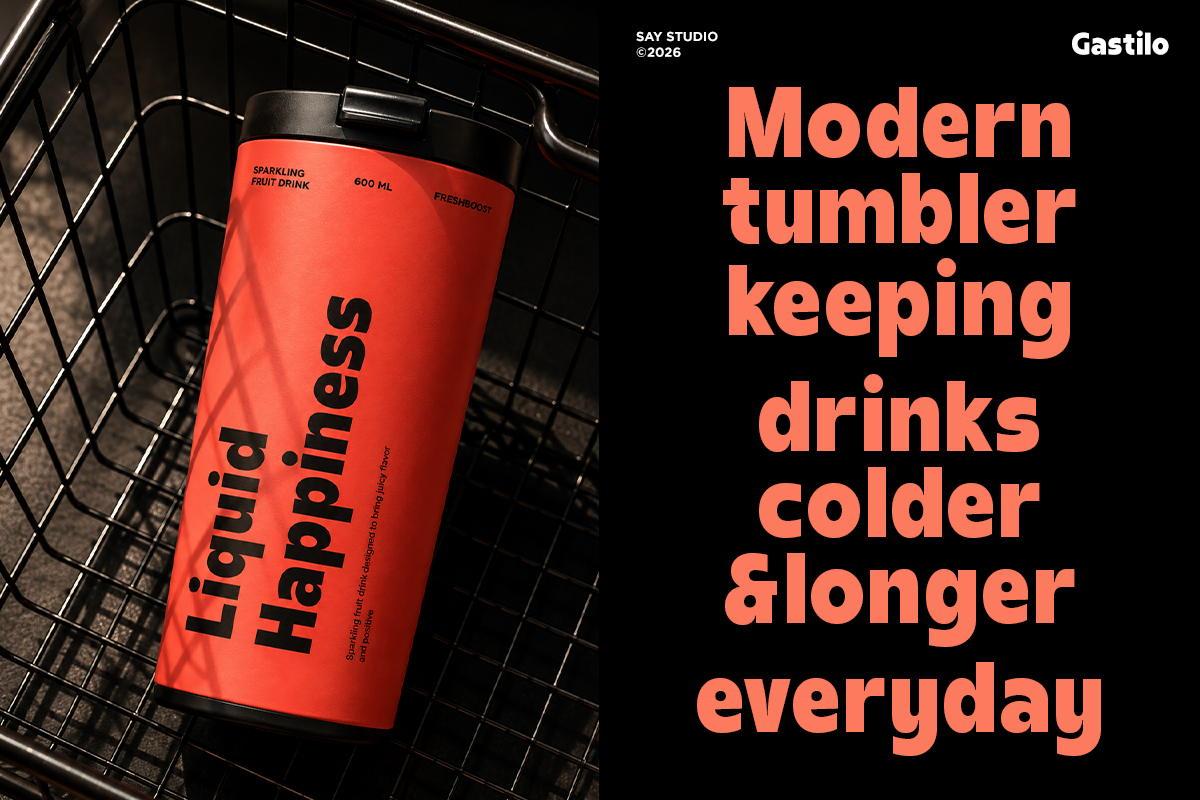 Bright coral tumbler mockup sitting in wire basket, black label reads "Liquid.Happiness" on dark background