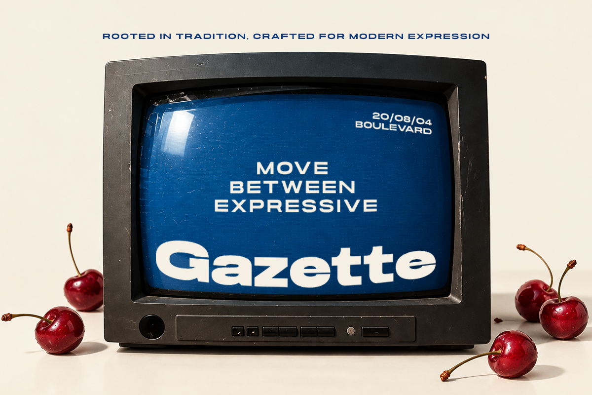 Retro CRT monitor displaying blue screen with Gazette branding, cherries scattered around it