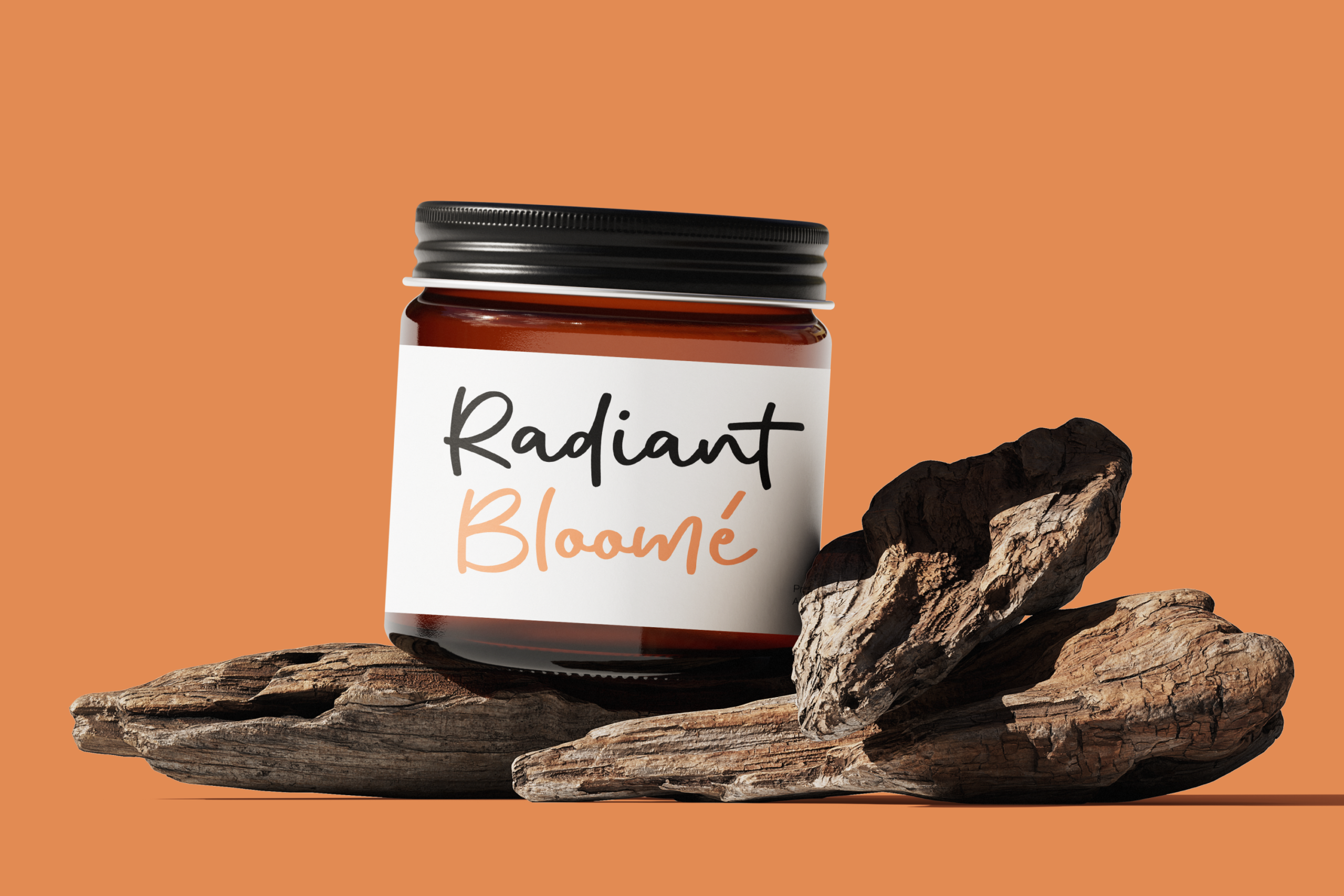 Amber glass jar with black lid on driftwood against warm orange background, label reads Radiant Bloome