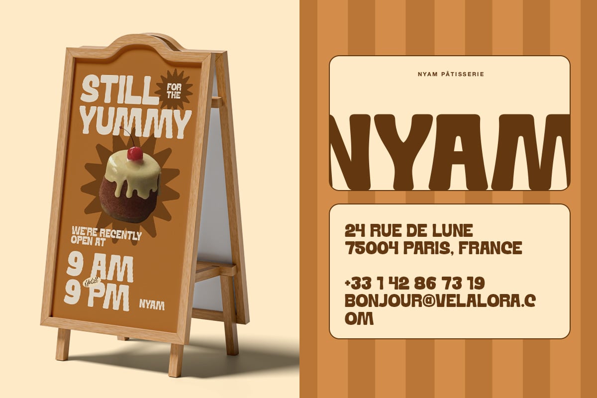 Wooden A-frame sandwich board mockup with pastry shop branding on warm tan background
