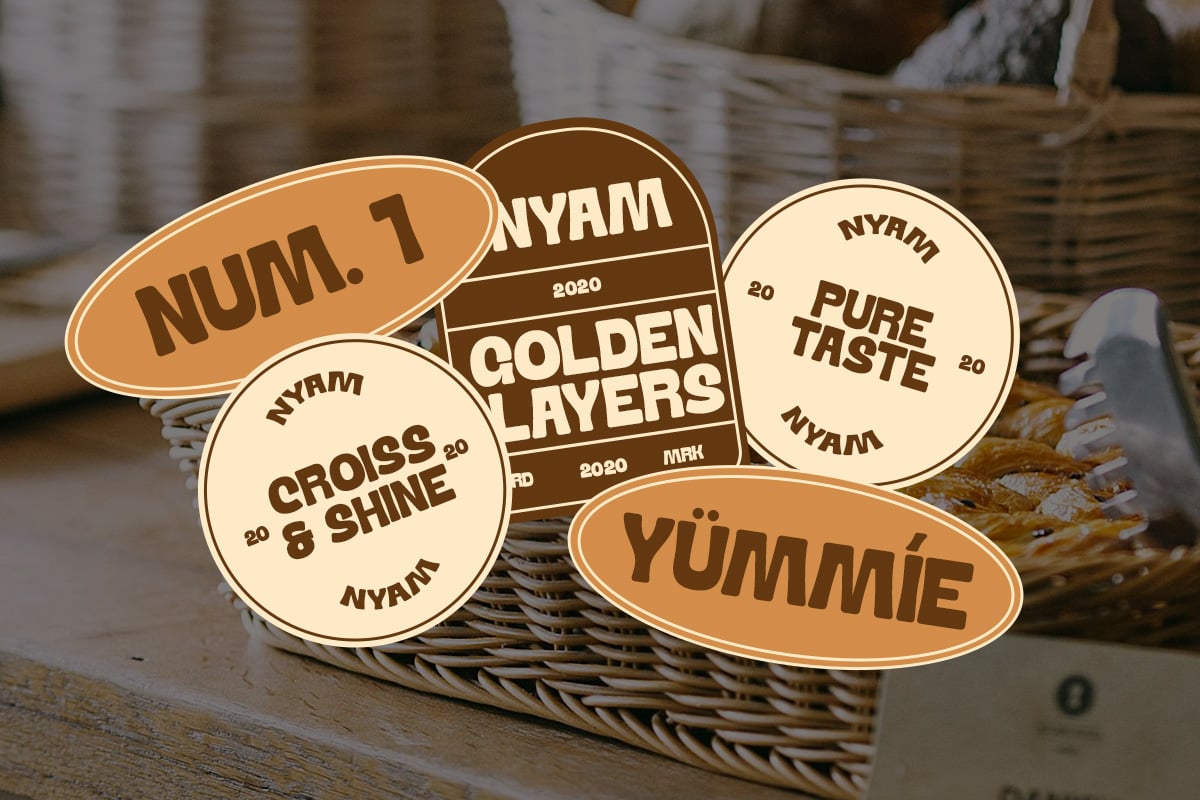 Retro sticker mockup with cream plus tan labels in woven basket on wooden surface