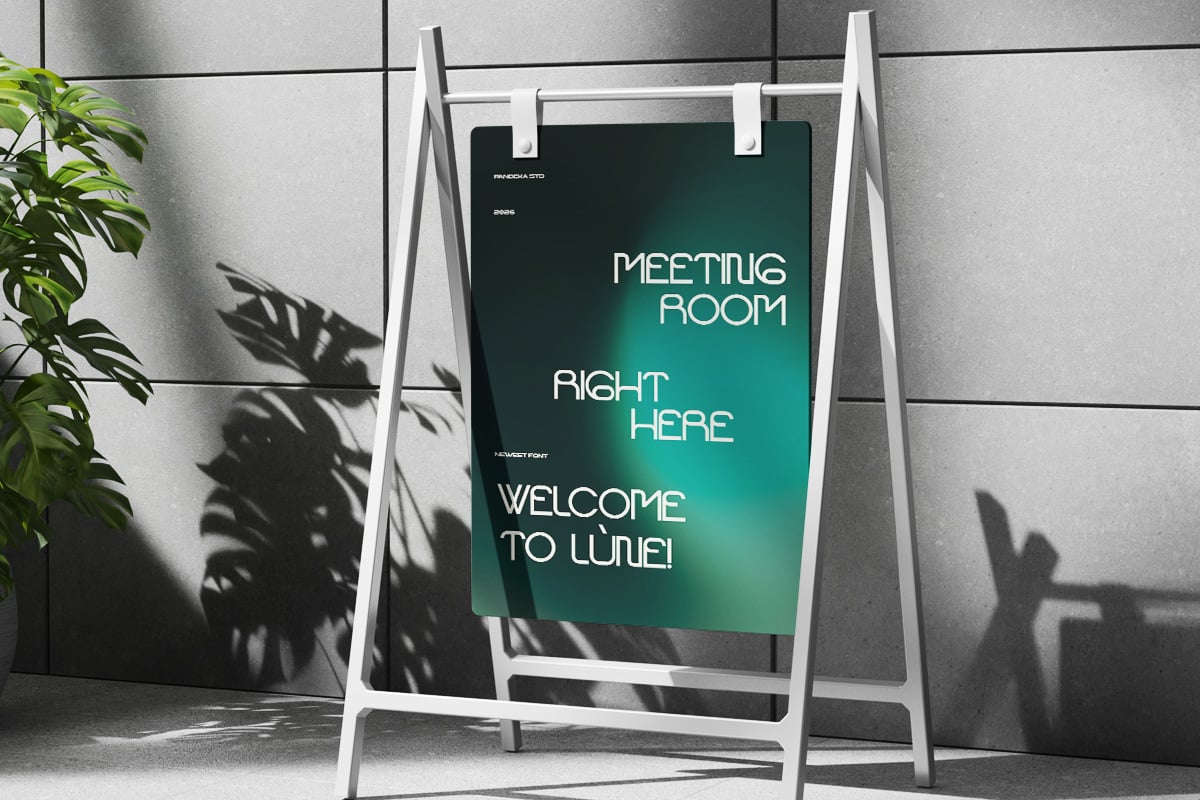Teal sandwich board sign mockup with modern sans serif text in minimalist office lobby setting
