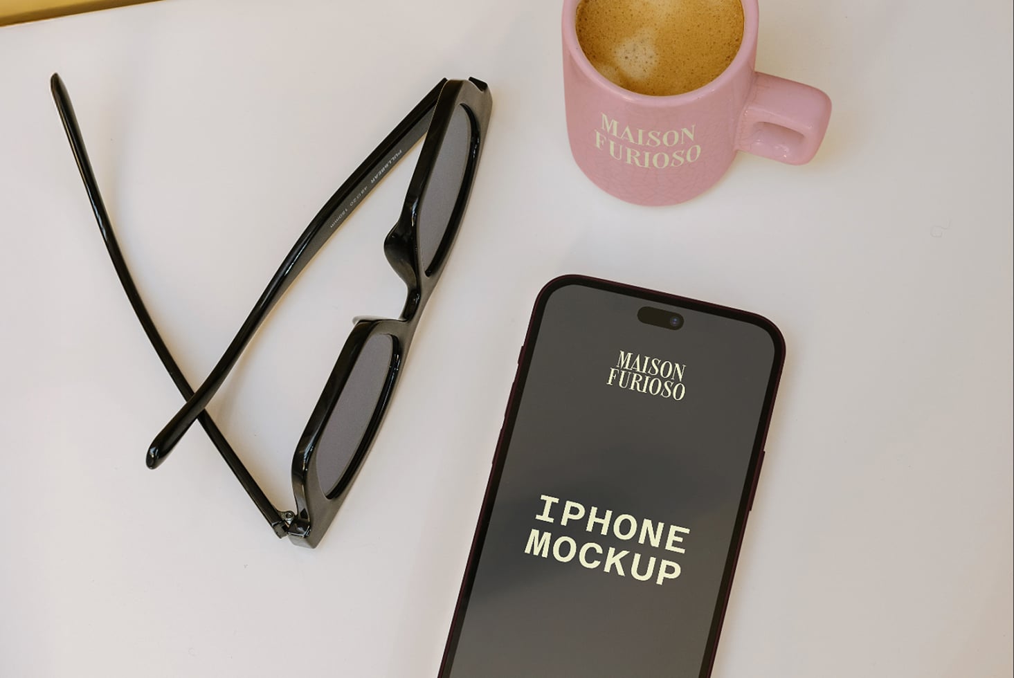 iPhone mockup styled with sunglasses, pink coffee mug, brush on white background