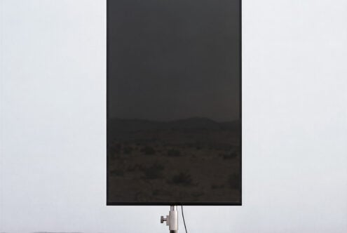 Blank smartphone screen mockup on light background with metal stand