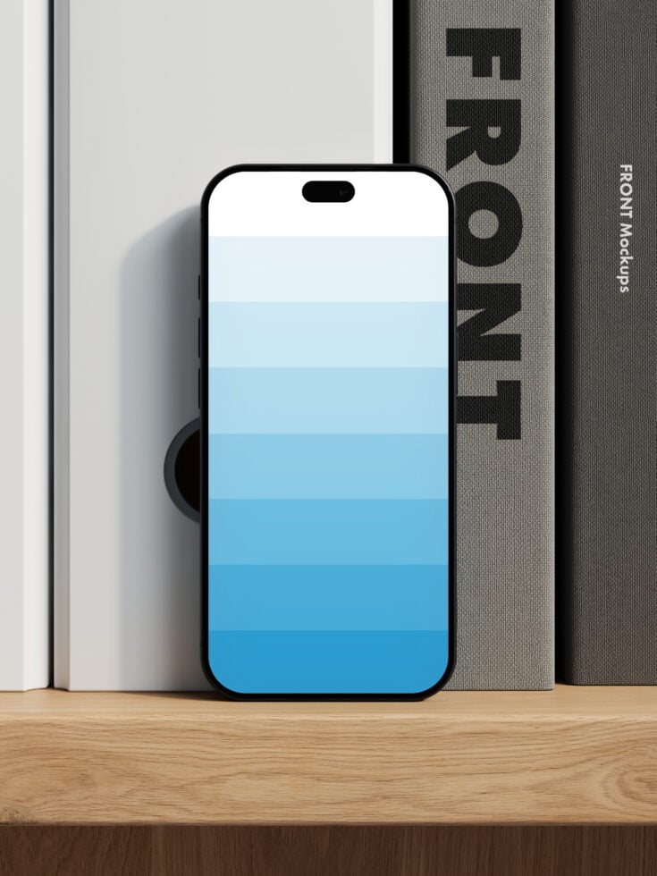 iPhone 14 Pro mockup with blue gradient screen leaning on books