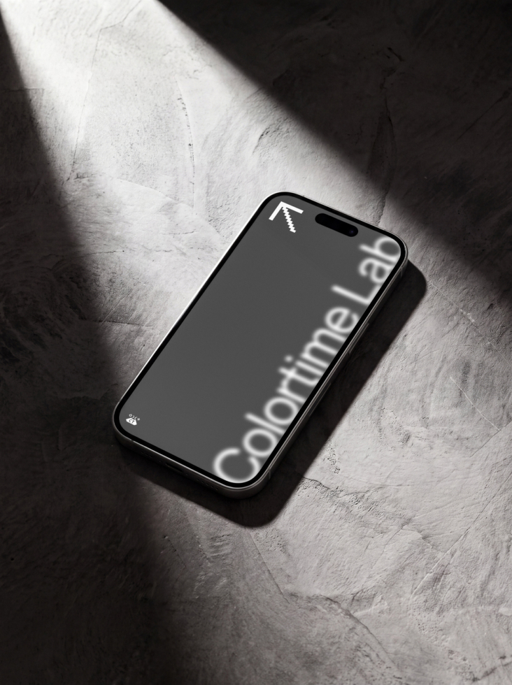 Black phone mockup on concrete with dramatic window light casting shadows