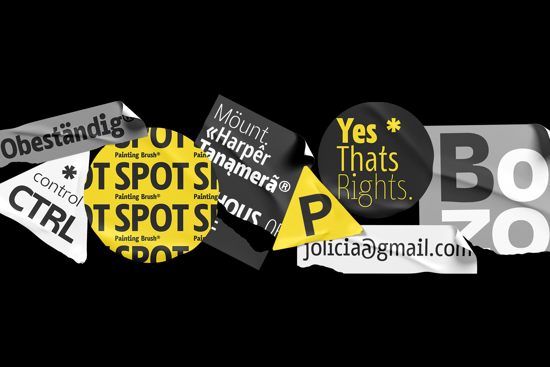 Scattered sticker mockups with yellow, black, white showing paint brush branding on black background