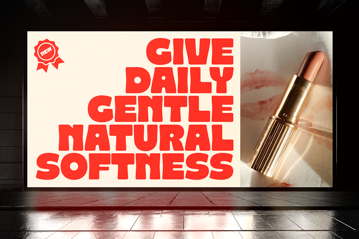 Billboard mockup with red typography next to luxury lipstick product shot