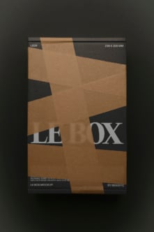Kraft box mockup with diagonal black tape strips over crumpled brown paper texture