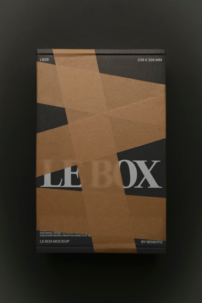 Kraft box mockup with diagonal black tape strips over crumpled brown paper texture