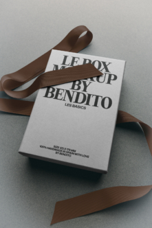 Luxury box mockup with brown ribbon featuring serif typography for high-end branding projects