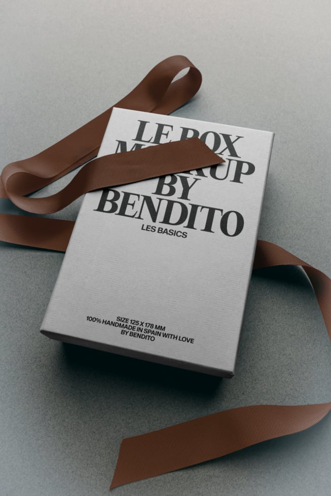 Luxury box mockup with brown ribbon featuring serif typography for high-end branding projects