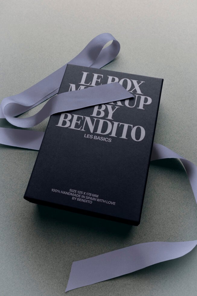 Luxury black box mockup with lavender ribbon tied around it, showing elegant serif typography for "Ledox" branding